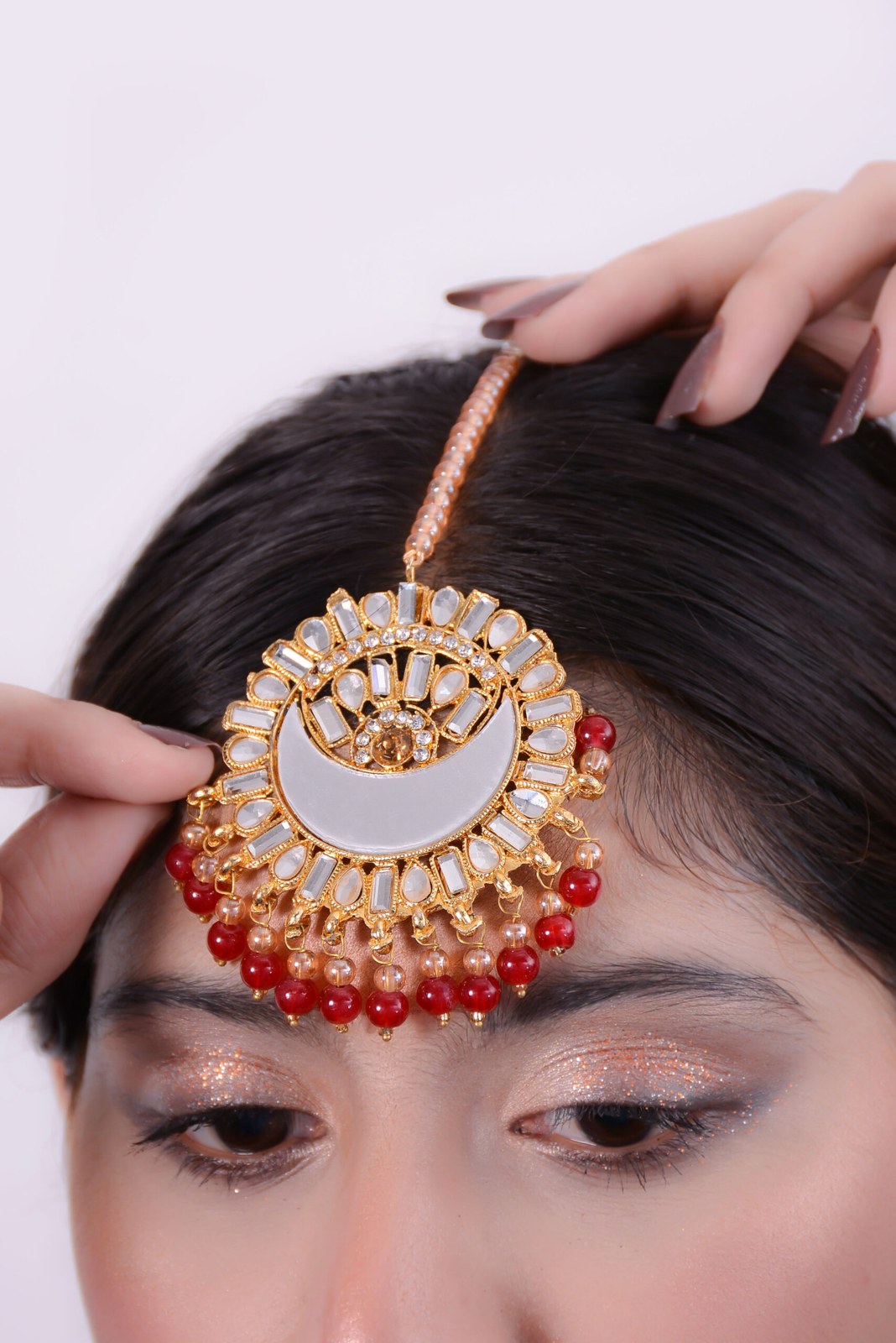 Maroon Pearl Golden Chandbali and Tikka Set
