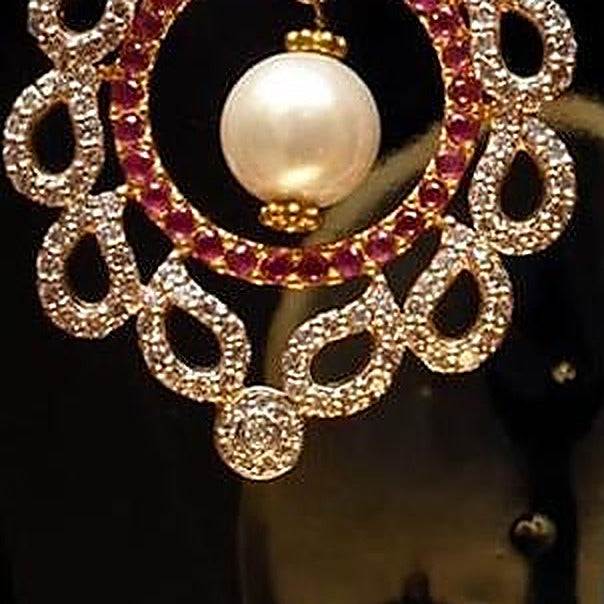 925 Silver Ruby Pearl Circle Drop Earrings - Close-up: pearl ring (left)