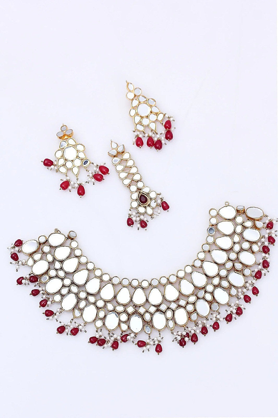 Silver Kundan Ruby Drop Choker Set - Full set: choker, tikka and earrings (flat lay)