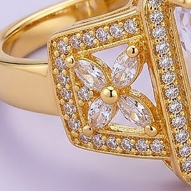 The Imperial Emerald-Cut Solitaire Ring - Close-up: side setting and flower
