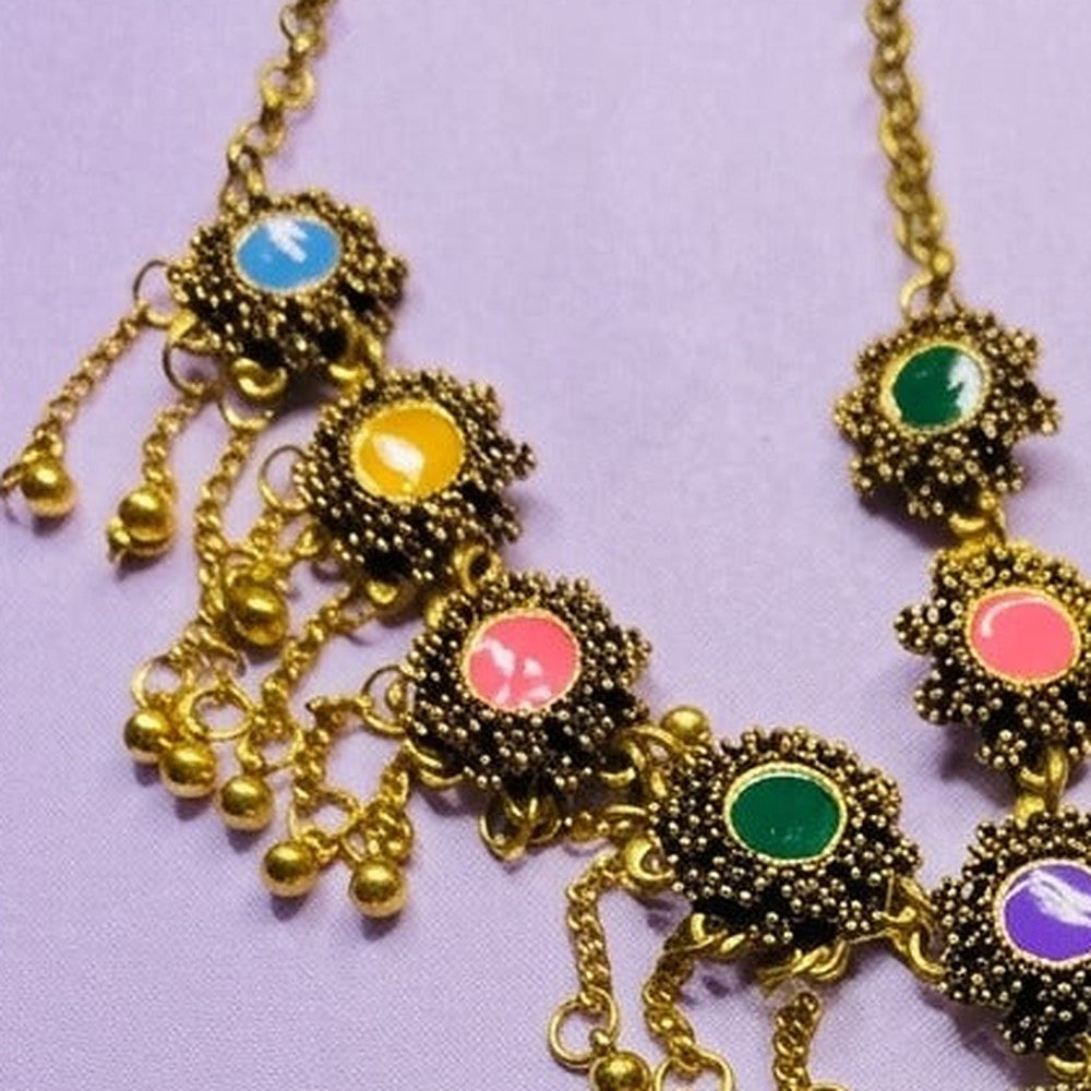 Vibrant Festive Meenakari Matha Patti - Close-up: upper left flower motifs